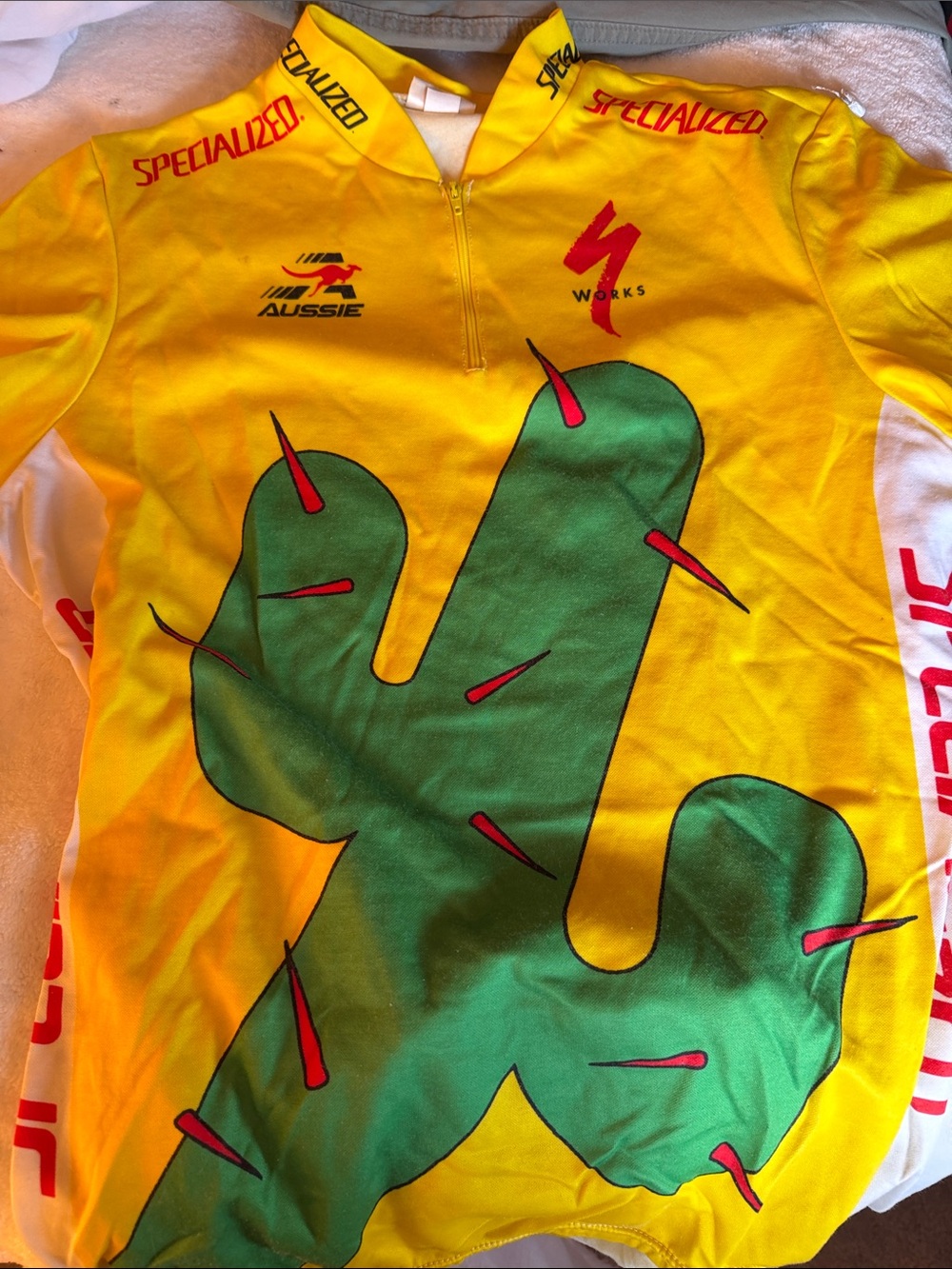 Specialized Yellow Cycling Jersey with Large Green Cactus Graphic